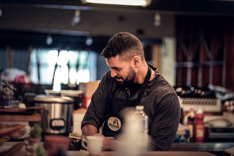 Head chef of Seasons Pizza in professional kitchen